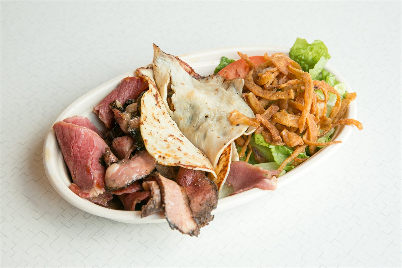 Pastrami and grilled deli salad